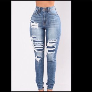 High waisted distressed jeans